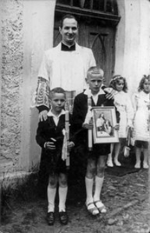 First Communion. Father Edmund Radtke parish priest in Wytown between 1959 and 1972