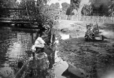Washing underwear in the pond