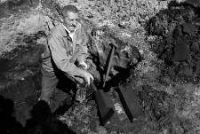 Władysław Drabkowski digging peat during the &lsquo;Black Wedding&rsquo; in Kluki (Slowinski Village Museum)