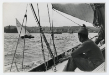 Black and white photograph: view of Dom Kuracyjny and Kasino Hotel in Sopot from a yacht on the Bay of Gdansk